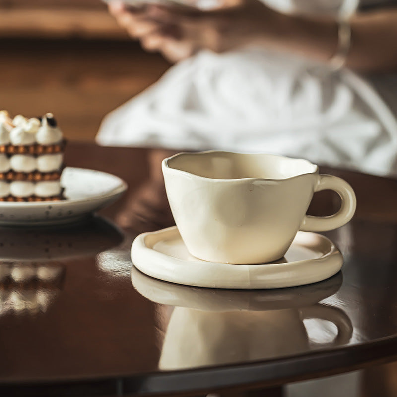 Ivory Ceramic Cup with Saucer
