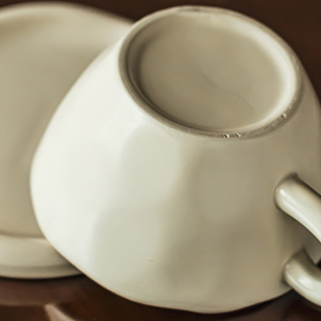 Ivory Ceramic Cup with Saucer