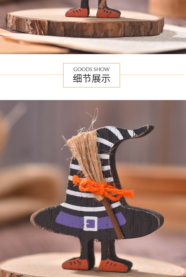 Decorative witch figurine with a broom on a wooden platform
